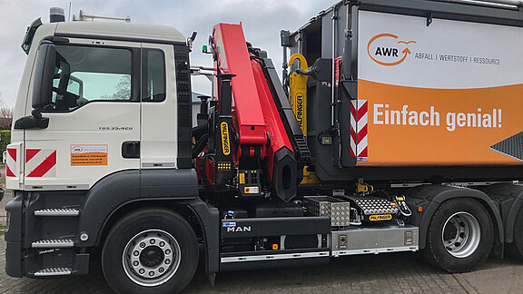 Palfinger Abrollkipper kombiniert mit Palfinger Ladekran Palfinger Ladekra